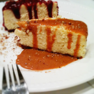 Cheesecake with strawberry or butterscotch sauce