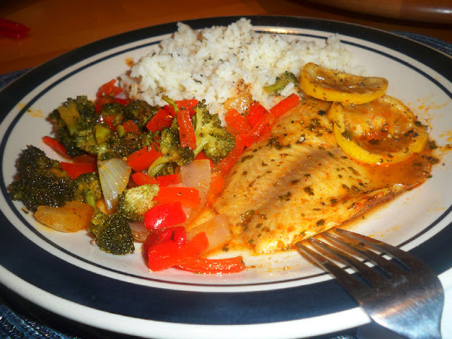 Baked tilapia and veggie foil packets