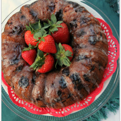 Berry Overload Bundt Cake with Vanilla Bean Glaze